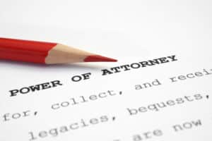 Power of Attorney text and red pencil.